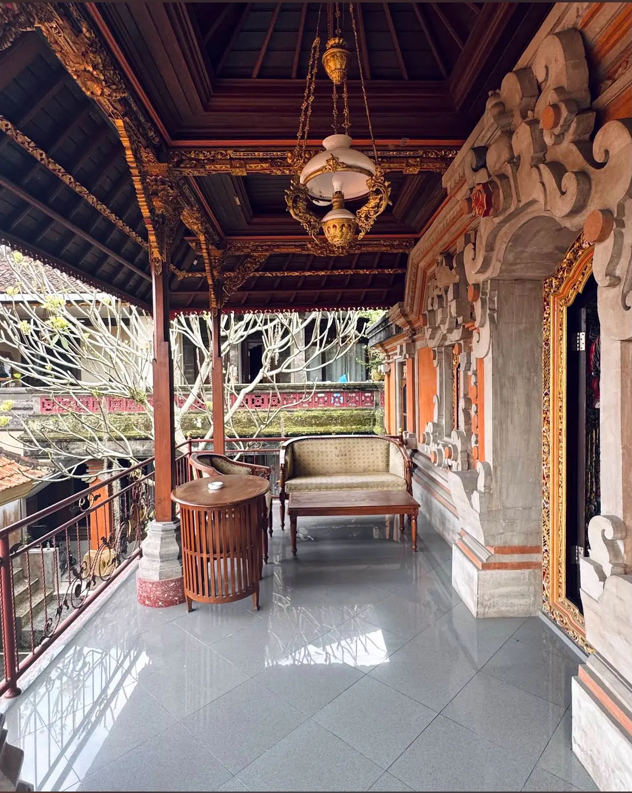 Carved Balinese Gedong veranda at Maha Artha Bungalows